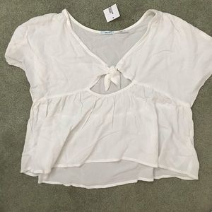 CUT OUT WHITE FLOWY TOP